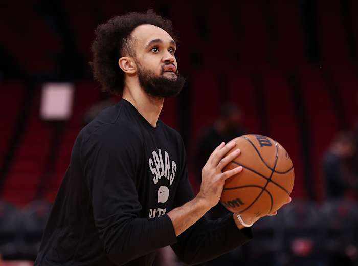 Jan 25, 2022; Houston, Texas, USA; San Antonio Spurs guard Derrick White (4) warms up before the game against the Houston Rockets at Toyota Center.
